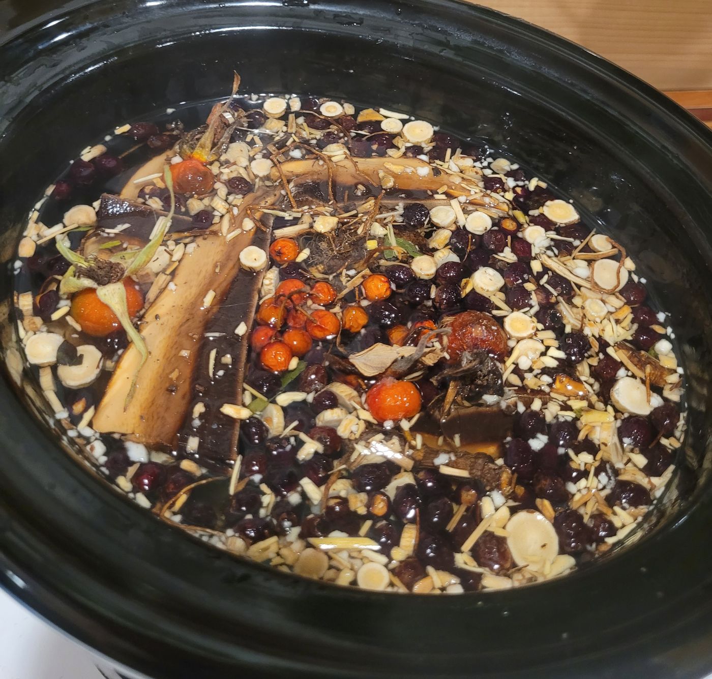 A slow decoction of roots, bark and berries