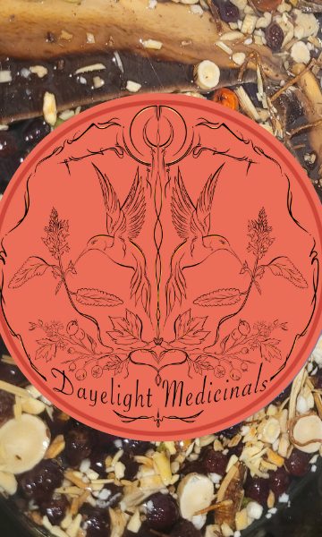 A jar of the Rejuvenation Tonic tea blend with roots, berries and bark